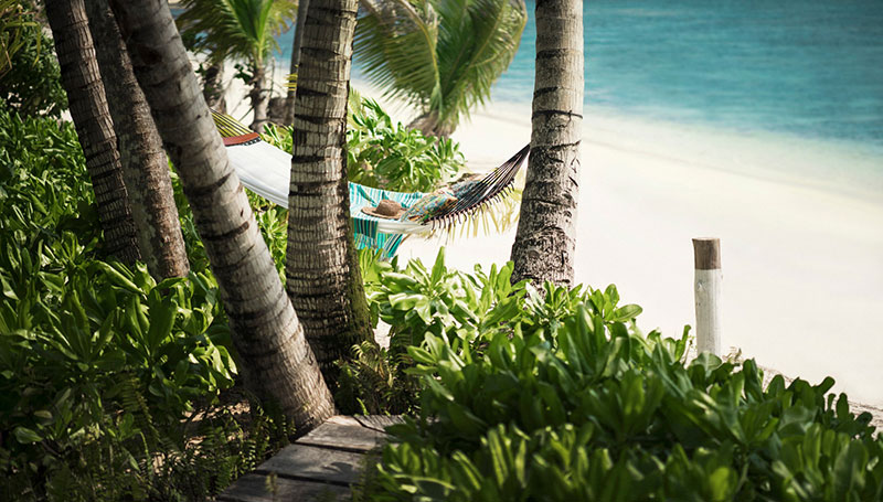 Entspannen in der Hängematte Four Seasons Resort Seychelles at Desroches Island: Entspannen in der Hängematte